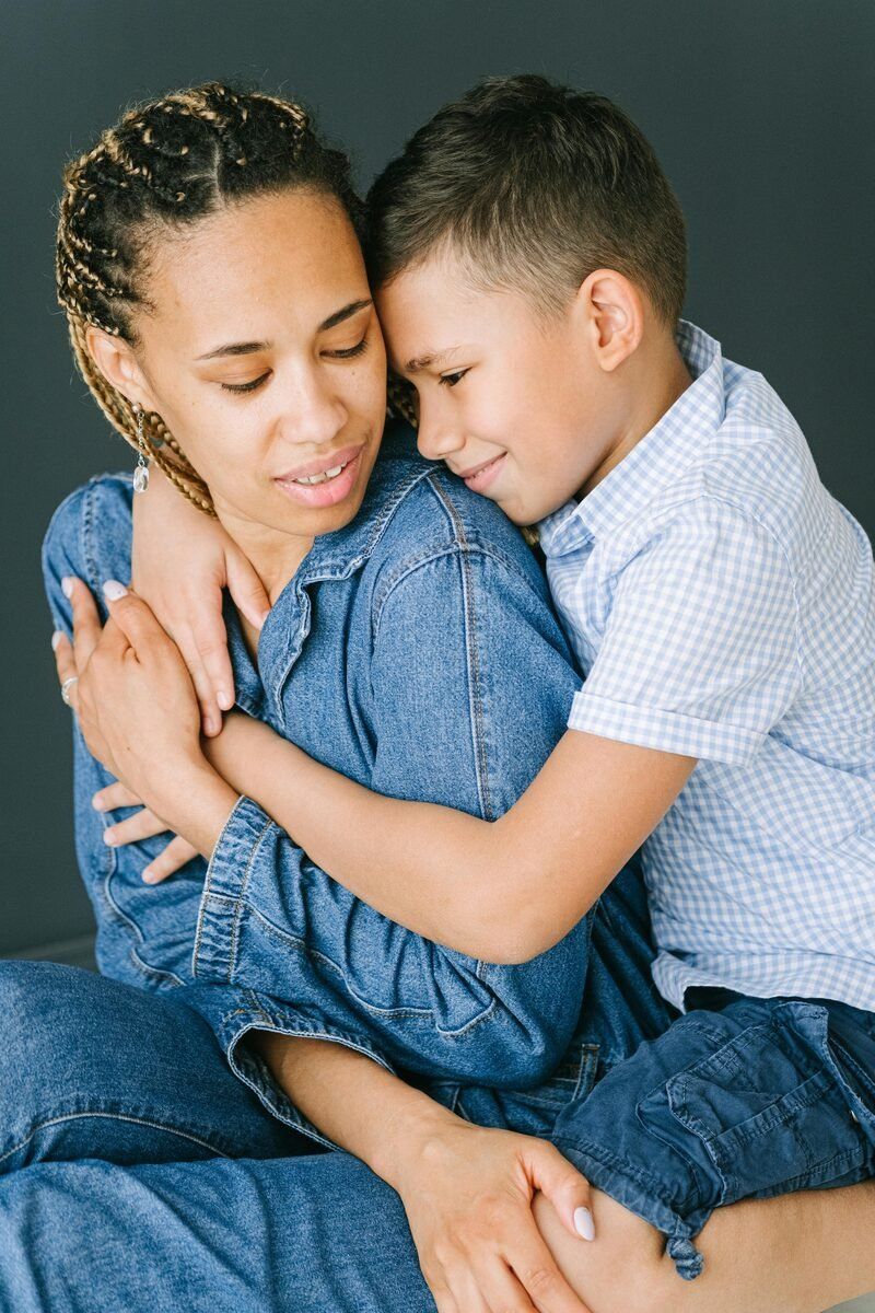 Child hugging parent in a quiet family moment