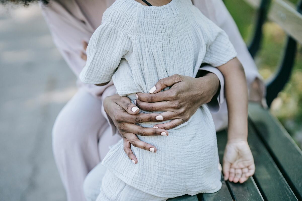 Parent under stress during a tense family moment